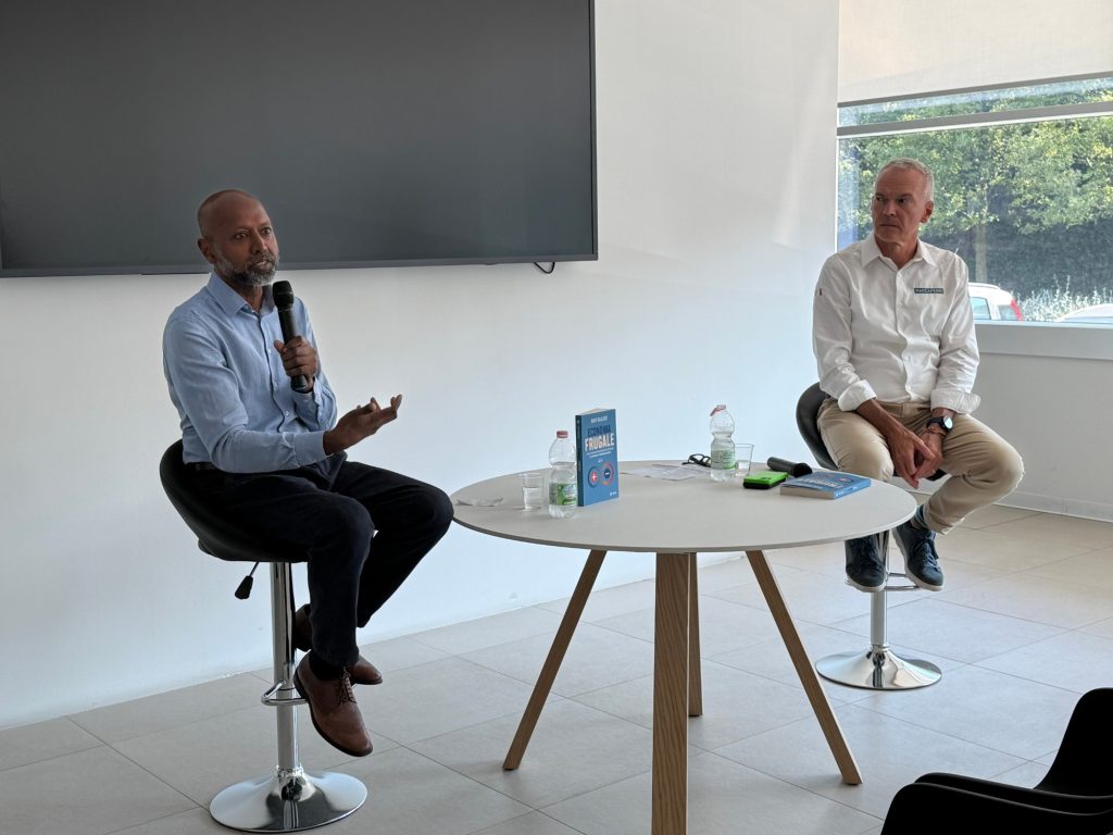 Navi Radjou and a Maccaferri speaker during the Frugal Economy talk