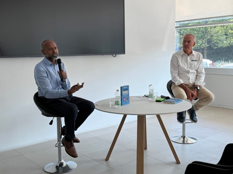 Navi Radjou and a Maccaferri speaker during the Frugal Economy talk